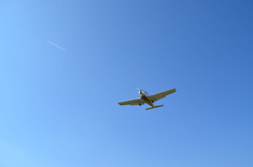 airplane in the blue sky