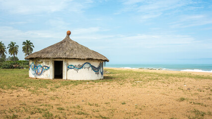 hut with a thatched roof in africa coast