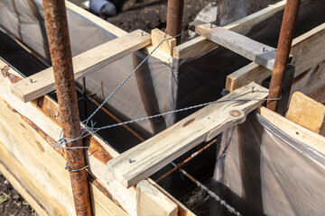Fototapeta na wymiar Pouring concrete into the foundation at a construction site.