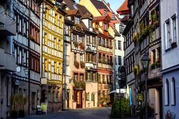 Old fachwerk half-timbered houses on Weissgerbergasse street in historical center of Nuremberg,...