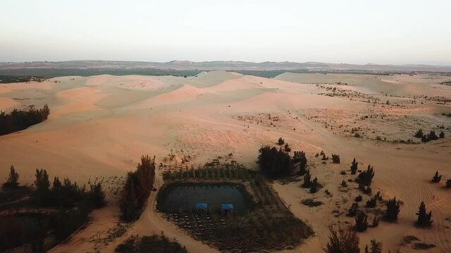 Aerial shot of White Sand Dunes during sunrise Mui Ne Vietnam