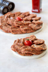 minced meatballs on a white background