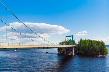 Aerial view of Karisalmi bridge on Pulkkilanharju Ridge at lake Paijanne, Paijanne National Park, Finland.