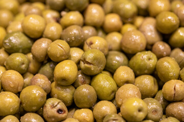 olives ready for sale on the counter