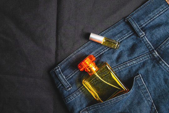 Perfume bottles and fragrances in jeans bags
