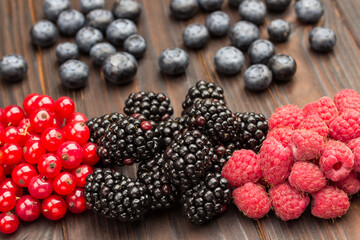 Blackberries, raspberries and red currants, blueberries close up