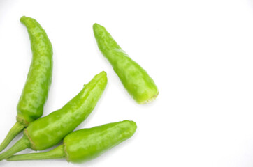 green chilly on white background