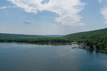 Aerial view of the south end of Owasco Lake near Moravia, Cayuga County, New York. A marina is on the right. 