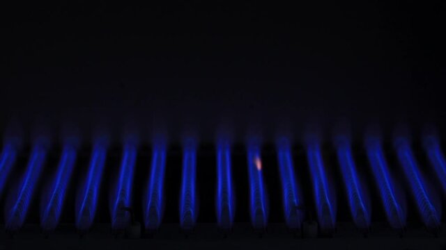 Ignition and burning of natural gas in water heater furnace