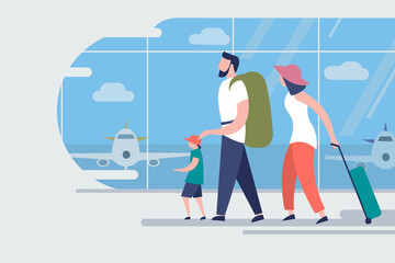 Obraz premium Family on a vacation trip walking in an airport to board a flight
