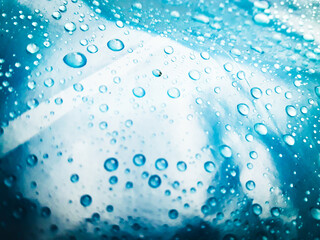 Water droplets on the blue background abstract texture