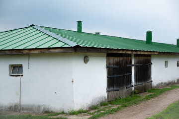 Fototapeta na wymiar old house in the countryside, horse farm