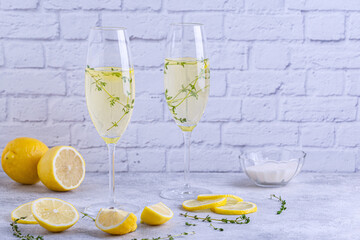 Homemade lemonade made from lemons and thyme.