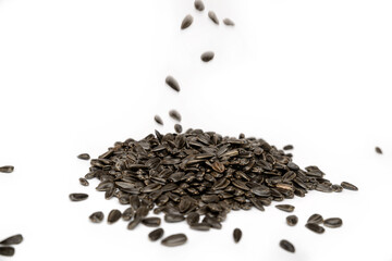 sunflower seeds close up on white background