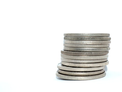 Pile Of Silver Coins Over White Background
