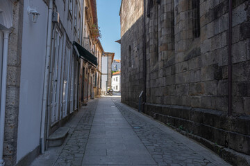 Alley With Cobblestones and Wall Of Ancient Church, Braga, Portugal