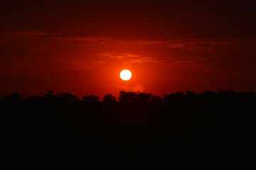 Obraz premium African sunset over the Okavango Delta in Botswana
