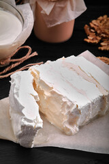 homemade cheese, milk and cottage cheese on a wooden background. rustic style. Set of dairy products, assortment of milk, cottage cheese, sour cream and yogurt