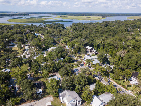 High angle aerial view of Bluffton, South Carolina with the Maye River in the background.