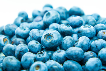 Large blue blueberry. Swamp autumn food berry close-up macro photography