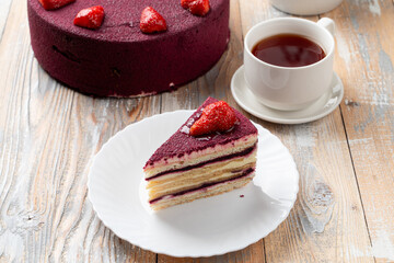 A slice of strawberry cake with velvet icing, menu photo