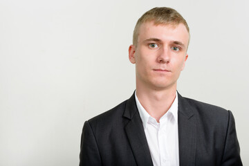 Portrait of young businessman with blond hair