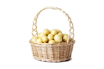 Golden Potatoes in a basket isolated on a white background.