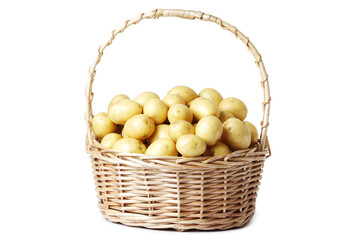 Golden Potatoes in a basket isolated on a white background.