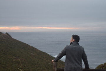 Fototapeta na wymiar Man looking at the Sea