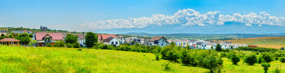 Fototapeta na wymiar neighborhood of houses in nature, Sibiu, Romania