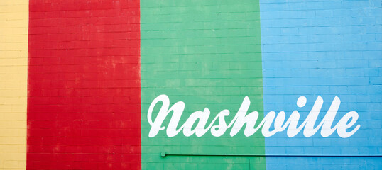 Yellow, Red, Green, and Blue Wall with Nashville Text - obrazy, fototapety, plakaty