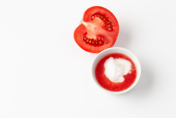 Fototapeta premium Top view of organic natural tomato juice and baking soda
