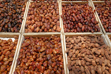  many date fruits display for sale at local market 