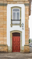 Fototapeta na wymiar Old baroque church door in São João del-Rei