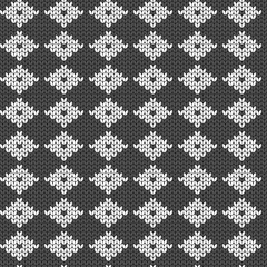 Geometric pattern. Imitation knitting or embroidery. Seamless background. Jacquard.