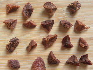 Brown color roasted broken Areca nuts