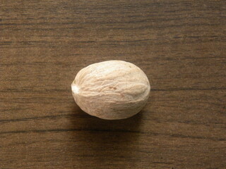 Brown color dry whole Nutmeg seed