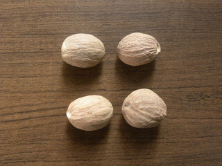 Brown color dry whole Nutmeg seeds