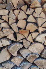 stack of firewood. The firewood is neatly stacked

