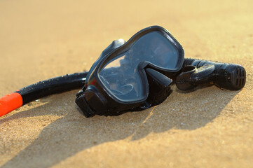 Diving equipment--Blue diving goggles,snorkel and flippers on