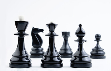 Chess pieces on a white background. Board logical antagonistic game. Intellectual sports.
