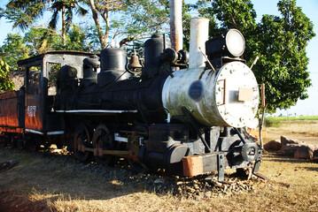 an old black steam locomotive that was used on sugar plantations