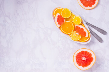 fresh mixed fruits. Healthy eating, dieting. health food of citrus. oranges, lemons and grapefruit on white background and  plate.