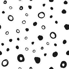 Doodle circles seamless pattern. Black dots texture background.