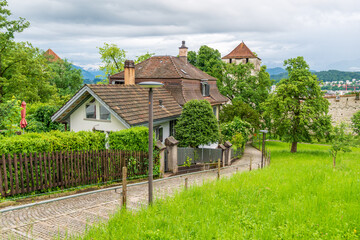 A perfect neighbourhood. Houses in suburb at Summer in Lucerne, Switzerland. Luxury houses with nice landscape.