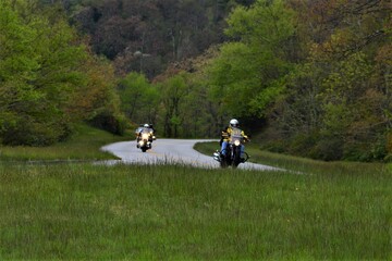 Bikers on Back roads Landscape Orientation 