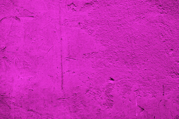 Old pink concrete wall with uneven texture