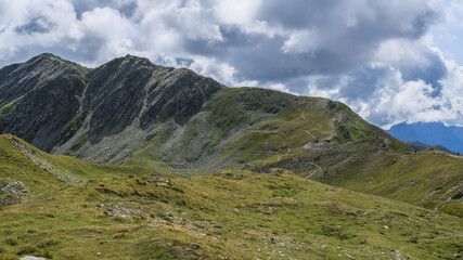 Fototapeta premium View of the Carnic Alps ridge as seen from the high Carnic Peace Trail along the long distance Carnic Highroute trek in Austria and Italy.
