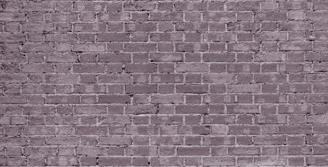 Gray brick wall. Loft interior design. Gray paint of the facade.