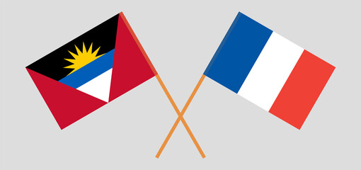 Crossed flags of France and Antigua and Barbuda